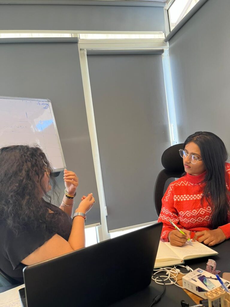 Students discussing SEO strategy in class